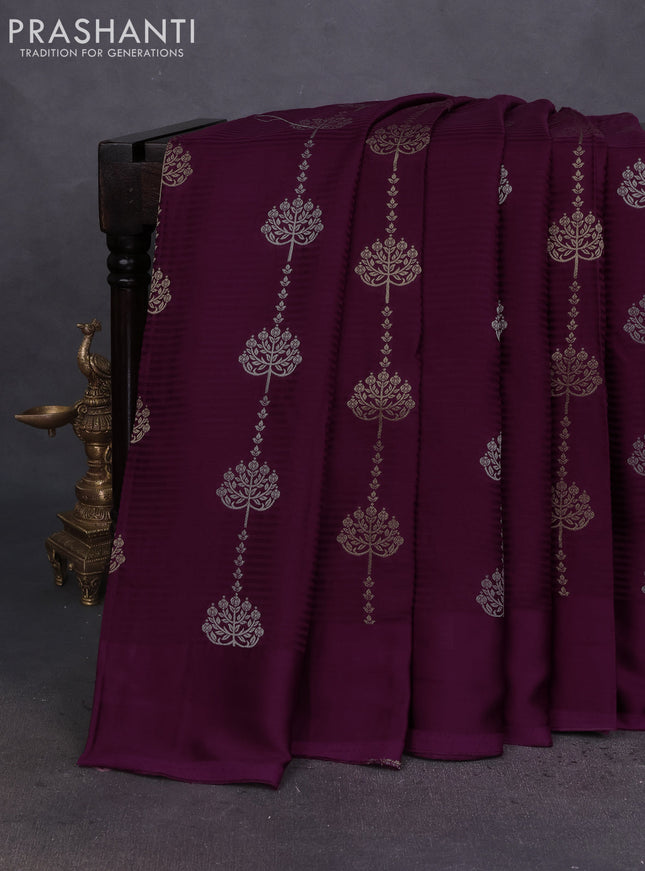 Banarasi mushru silk saree wine shade with allover stripes pattern & zari buttas and satin border