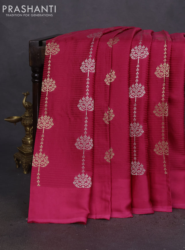 Banarasi mushru silk saree pink with allover stripes pattern & zari buttas and satin border