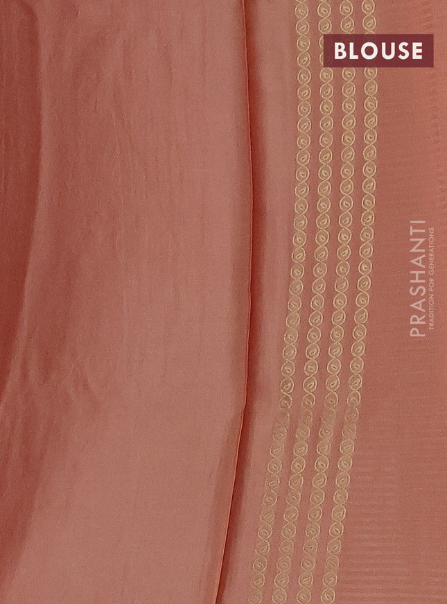 Banarasi mushru silk saree peach shade with allover stripes pattern & zari weaves and satin border