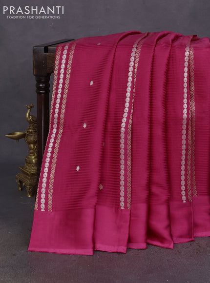 Banarasi mushru silk saree pink with allover stripes pattern & zari weaves and satin border