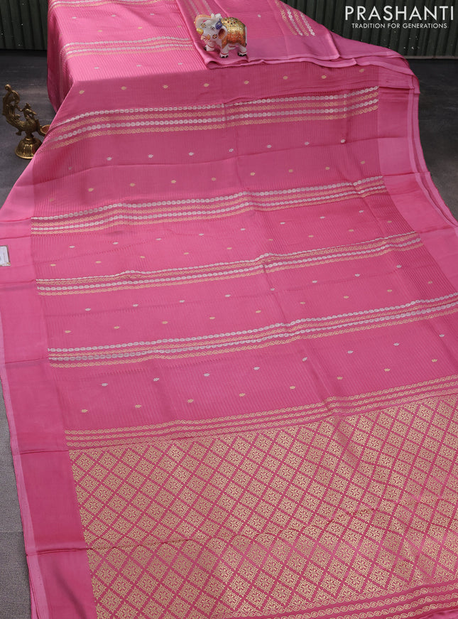 Banarasi mushru silk saree light pink with allover stripes pattern & zari weaves and satin border