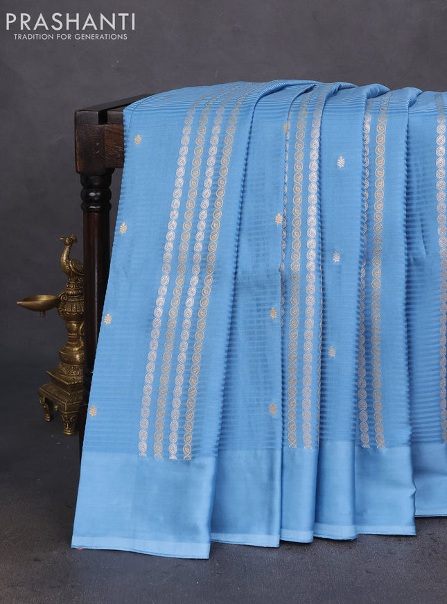 Banarasi mushru silk saree light blue with allover stripes pattern & zari weaves and satin border