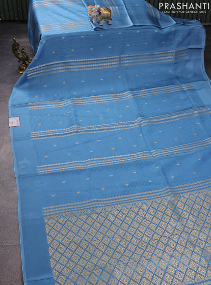 Banarasi mushru silk saree light blue with allover stripes pattern & zari weaves and satin border
