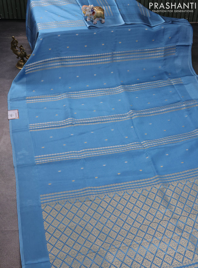 Banarasi mushru silk saree light blue with allover stripes pattern & zari weaves and satin border