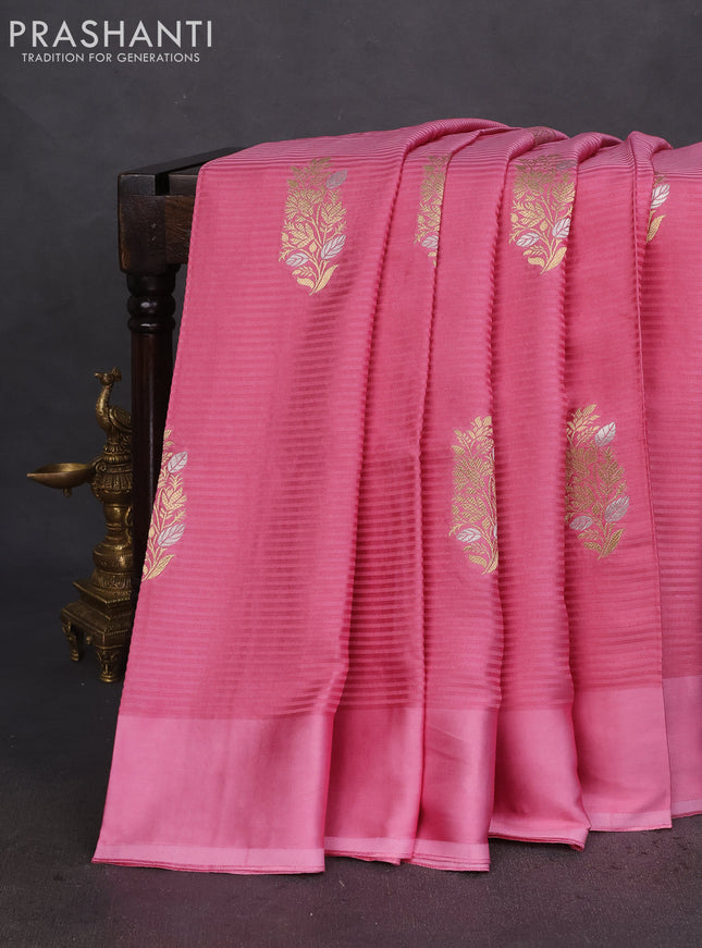 Banarasi mushru silk saree pink with allover stripes pattern & zari weaves and satin border
