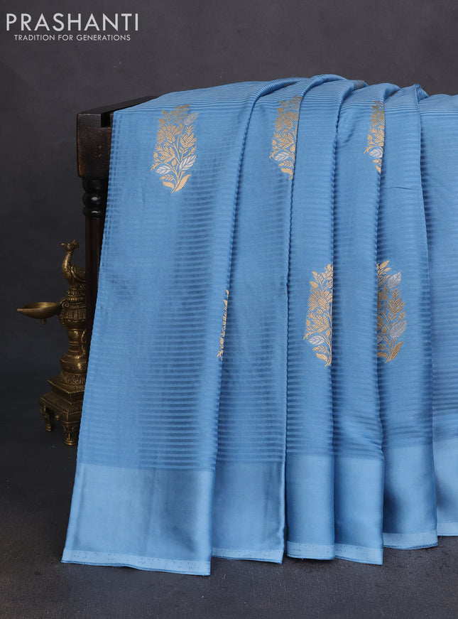 Banarasi mushru silk saree light blue with allover stripes pattern & zari weaves and satin border
