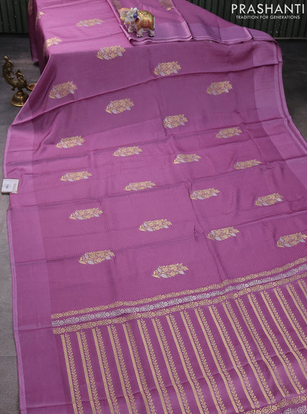 Banarasi mushru silk saree mild lavender with allover stripes pattern & zari weaves and satin border