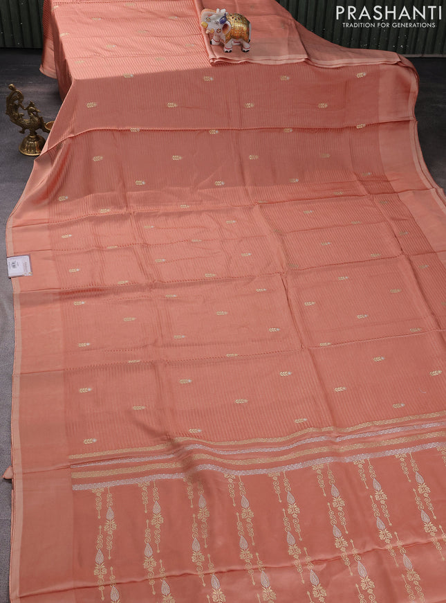 Banarasi mushru silk saree pale orange with allover stripes pattern & zari weaves and satin border