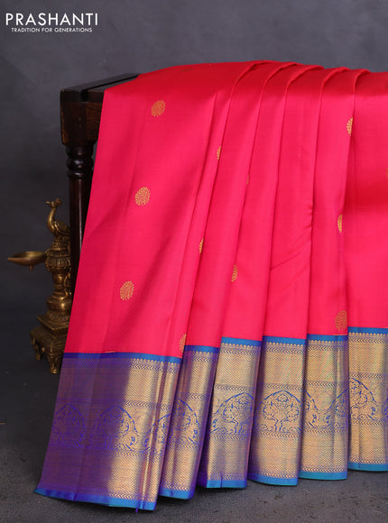 Pure kanchipuram silk saree pink and dual shade of bluish green with zari woven buttas and rich zari woven korvai border