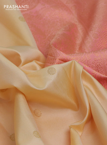 Pure kanchipuram silk saree cream and dual shade of peach with zari woven buttas and rich zari woven border
