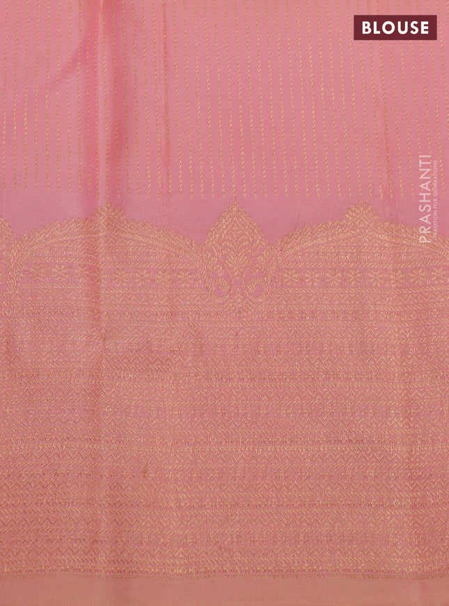 Pure kanchipuram silk saree cream and dual shade of peach with zari woven buttas and rich zari woven border