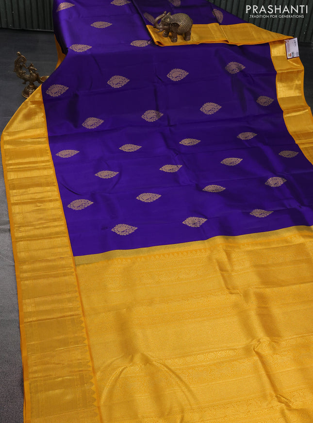 Pure kanchipuram silk saree blue and yellow with zari woven buttas and rich zari woven korvai border