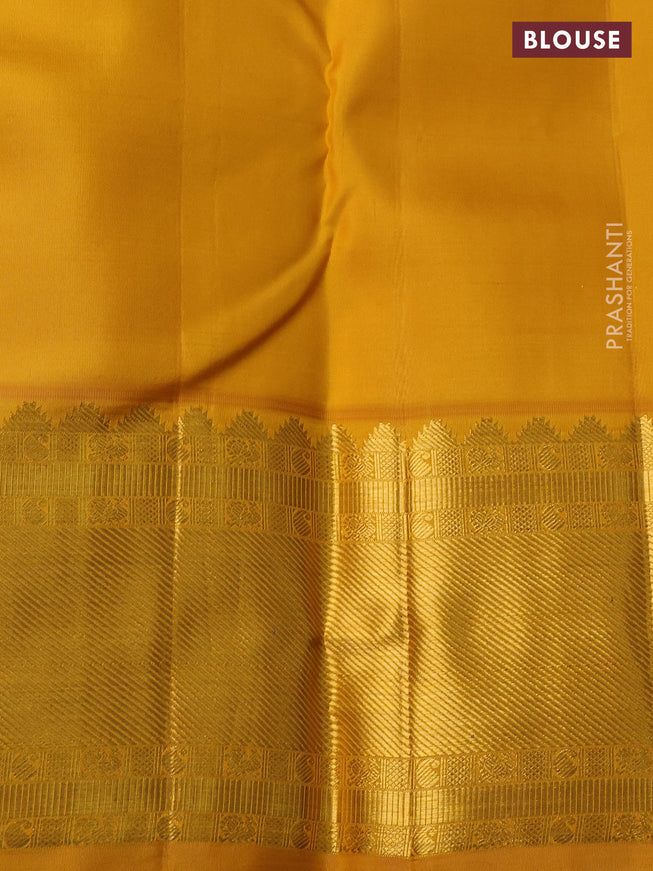 Pure kanchipuram silk saree blue and yellow with zari woven buttas and rich zari woven korvai border