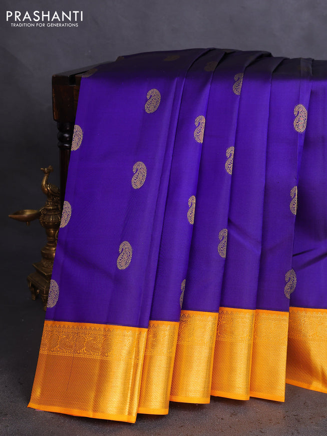 Pure kanchipuram silk saree blue and yellow with paisley zari woven buttas and rich zari woven border