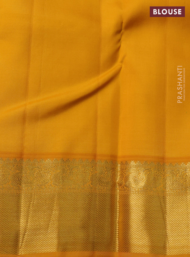 Pure kanchipuram silk saree blue and yellow with paisley zari woven buttas and rich zari woven border