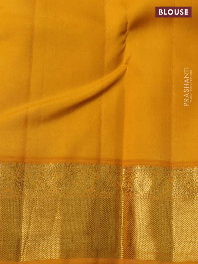 Pure kanchipuram silk saree blue and yellow with paisley zari woven buttas and rich zari woven border