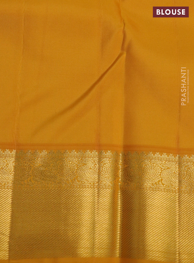 Pure kanchipuram silk saree green and mustard yellow with zari woven buttas and rich zari woven border