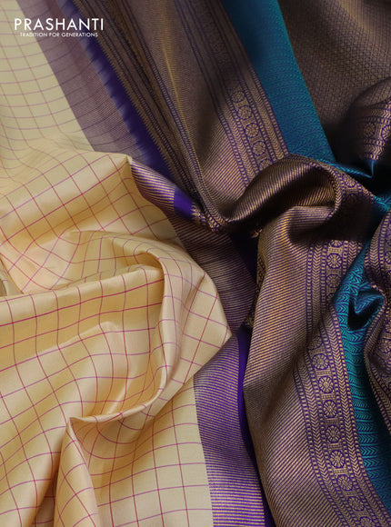 Pure kanchipuram silk saree cream and blue with allover checked pattern and rettapet zari woven border