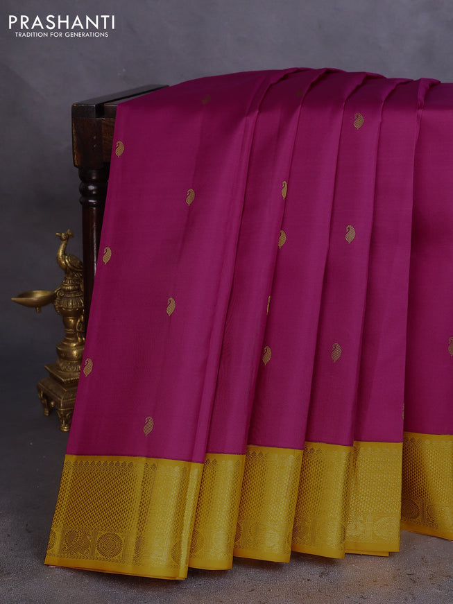 Pure kanchipuram silk saree magenta pink and mustard yellow with paisley zari woven buttas and rich zari woven border