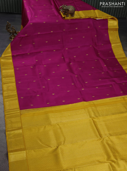 Pure kanchipuram silk saree magenta pink and mustard yellow with paisley zari woven buttas and rich zari woven border