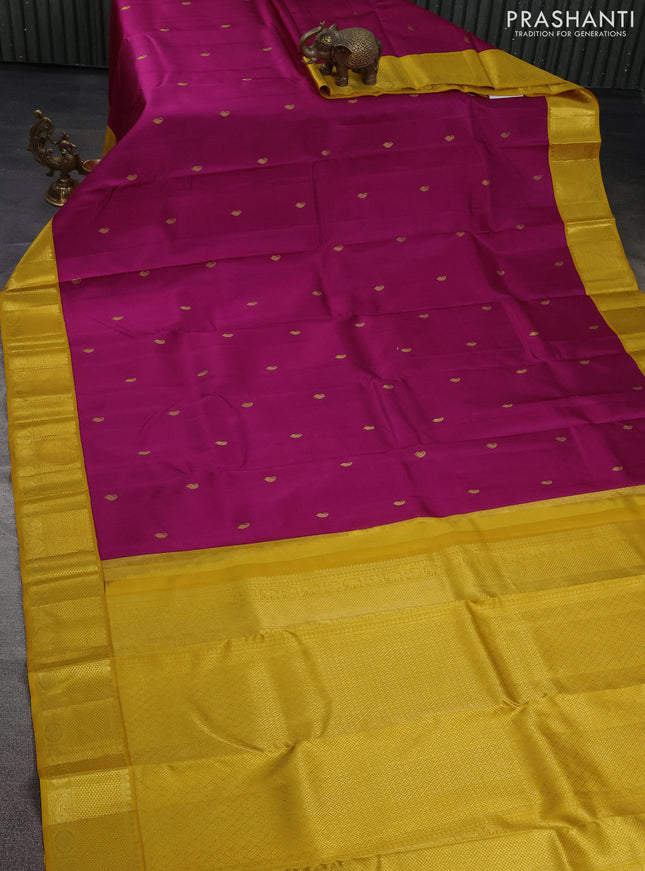 Pure kanchipuram silk saree magenta pink and mustard yellow with paisley zari woven buttas and rich zari woven border