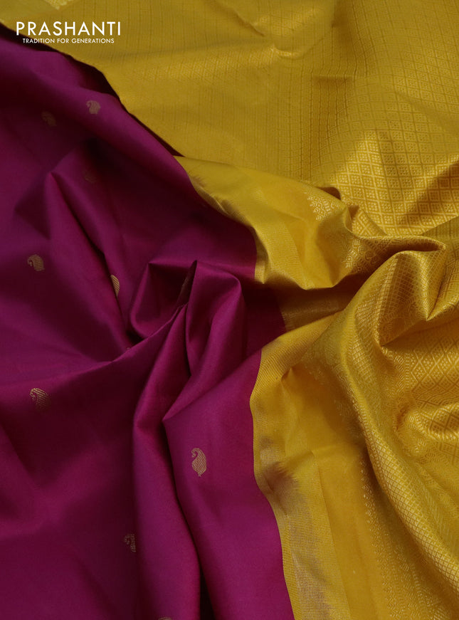 Pure kanchipuram silk saree magenta pink and mustard yellow with paisley zari woven buttas and rich zari woven border
