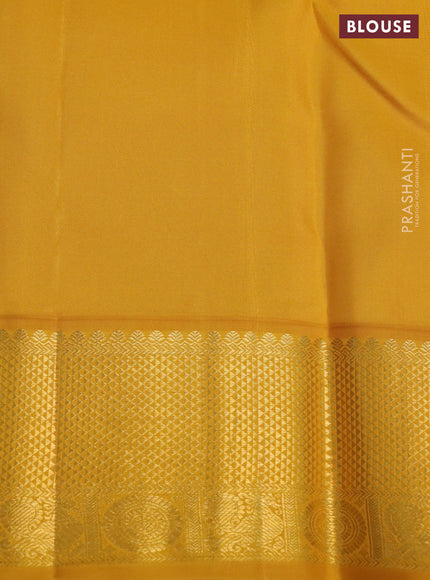 Pure kanchipuram silk saree magenta pink and mustard yellow with paisley zari woven buttas and rich zari woven border