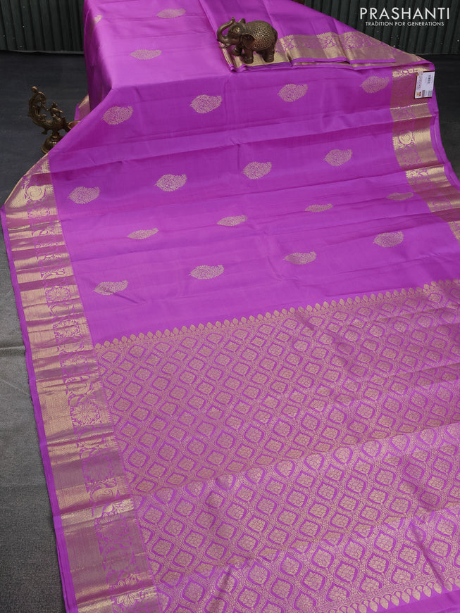 Pure kanchipuram silk saree lavender with zari woven paisley buttas and rich zari woven border
