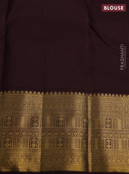 Pure kanchipuram silk saree dual shade of pinkish orange and coffee brown with allover zari stripe & buttas and zari woven korvai border