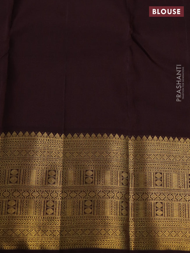 Pure kanchipuram silk saree dual shade of pinkish orange and coffee brown with allover zari stripe & buttas and zari woven korvai border