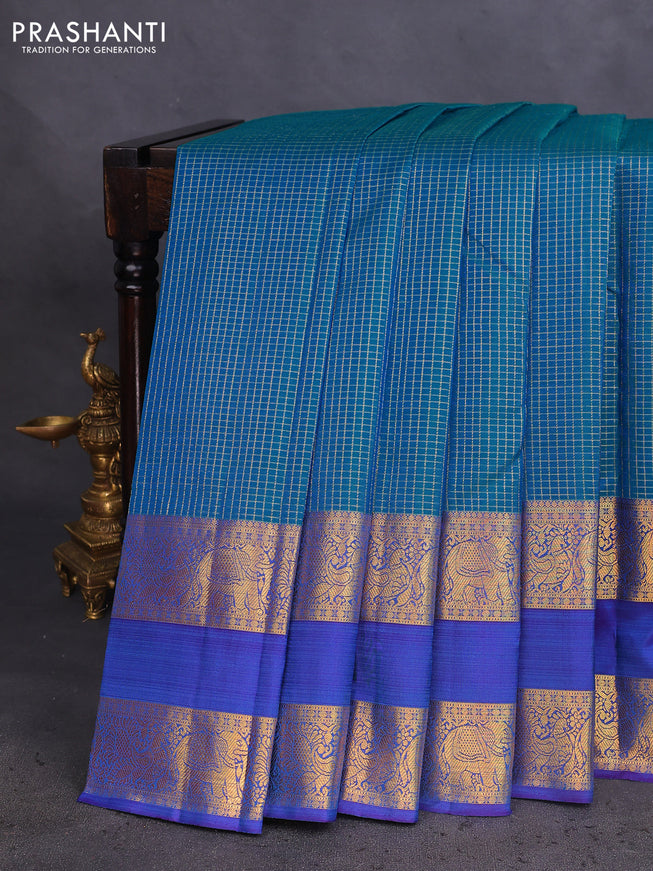Pure kanchipuram silk saree teal blue and blue with allover small zari checked pattern and long rettapet zari woven border
