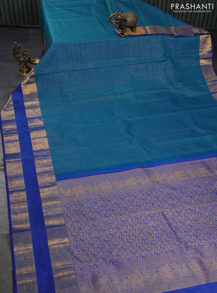 Pure kanchipuram silk saree teal blue and blue with allover small zari checked pattern and long rettapet zari woven border