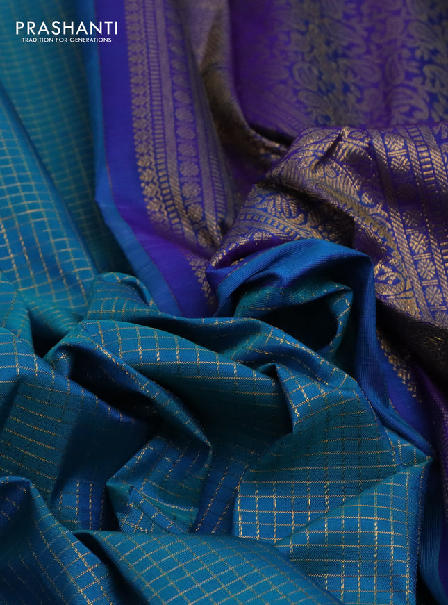Pure kanchipuram silk saree teal blue and blue with allover small zari checked pattern and long rettapet zari woven border