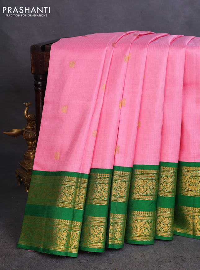 Pure kanchipuram silk saree light pink and green with allover zari weaves & buttas and rettapet zari woven korvai border