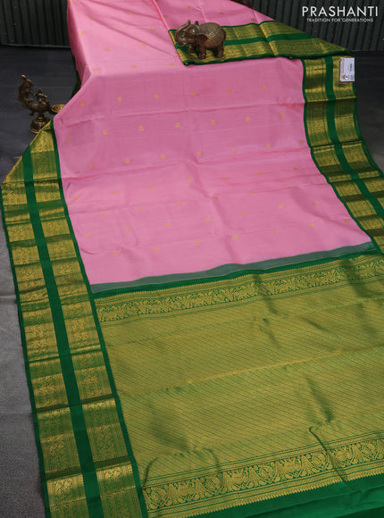 Pure kanchipuram silk saree light pink and green with allover zari weaves & buttas and rettapet zari woven korvai border