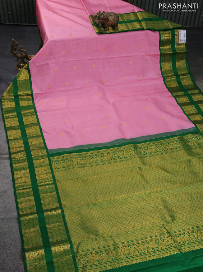 Pure kanchipuram silk saree light pink and green with allover zari weaves & buttas and rettapet zari woven korvai border