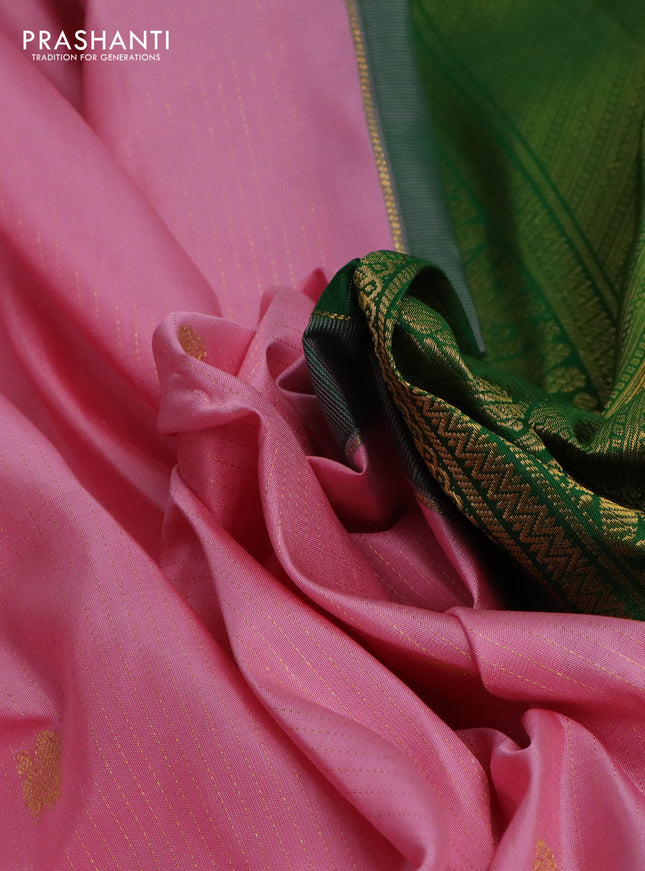 Pure kanchipuram silk saree light pink and green with allover zari weaves & buttas and rettapet zari woven korvai border