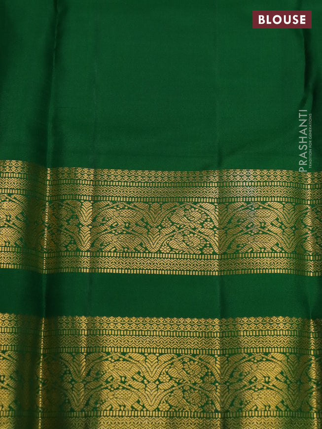Pure kanchipuram silk saree light pink and green with allover zari weaves & buttas and rettapet zari woven korvai border
