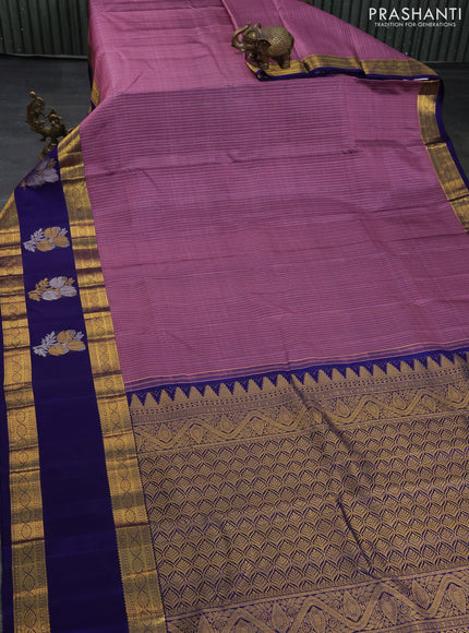 Pure kanchipuram silk saree pastel purple and dark blue with allover zari weaves and long zari woven butta border