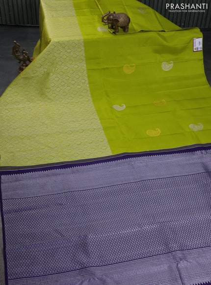 Pure kanchipuram silk saree lime green and navy blue with silver zari woven paisley buttas and long silver zari woven border