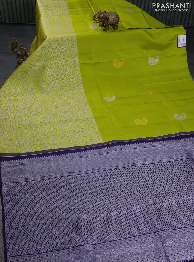 Pure kanchipuram silk saree lime green and navy blue with silver zari woven paisley buttas and long silver zari woven border