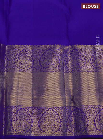 Pure kanchipuram silk saree dual shade of maroon and blue with annam & rudhraksha zari woven buttas and long zari woven border
