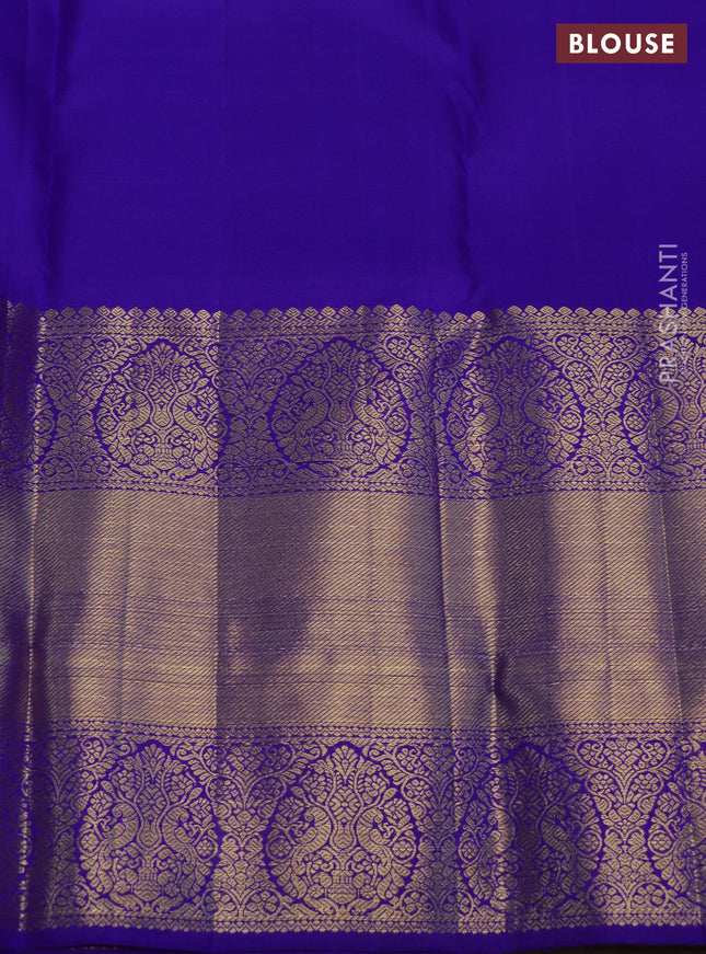 Pure kanchipuram silk saree dual shade of maroon and blue with annam & rudhraksha zari woven buttas and long zari woven border