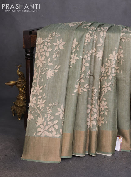 Pure tussar silk saree pastel green with allover floral digital prints and zari woven border