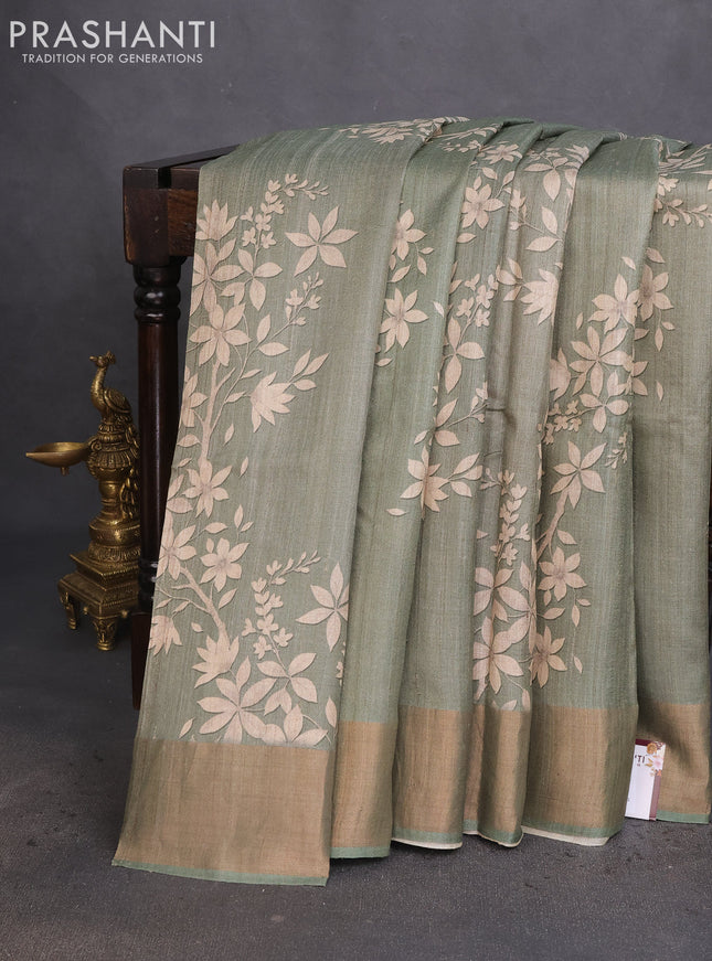 Pure tussar silk saree pastel green with allover floral digital prints and zari woven border