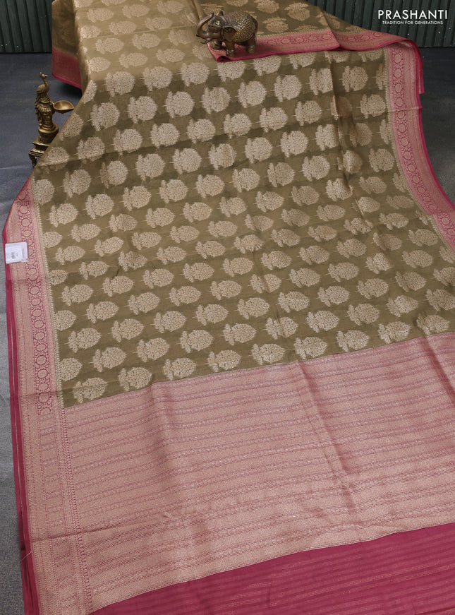 Banarasi silk cotton saree elaichi green and pastel maroon with allover thread & zari woven butta weaves and woven border