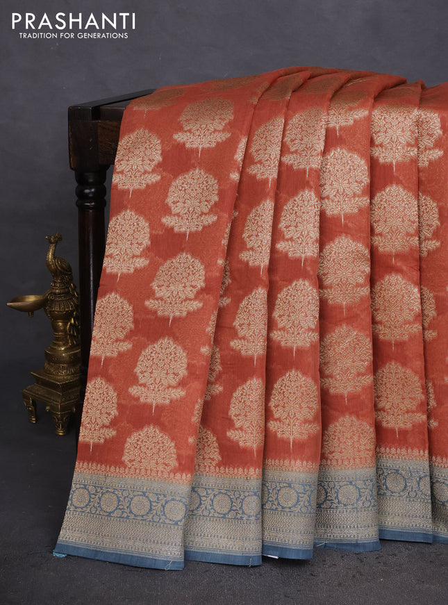 Banarasi silk cotton saree rust shade and pastel blue with allover thread & zari woven butta weaves and woven border