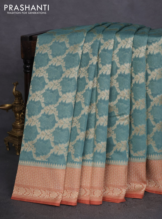 Banarasi silk cotton saree pastel blue and rust shade with allover thread & zari weaves and woven border