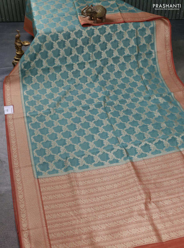 Banarasi silk cotton saree pastel blue and rust shade with allover thread & zari weaves and woven border