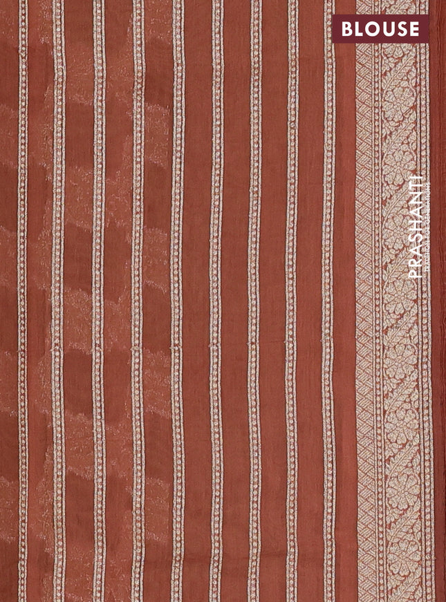 Banarasi silk cotton saree pastel green and rust shade with allover thread & zari weaves and woven border